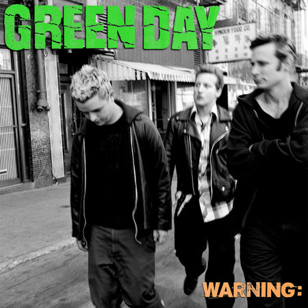 Green Day Warning 25th Anniversary orange vinyl album cover featured at ToucanRecords.com