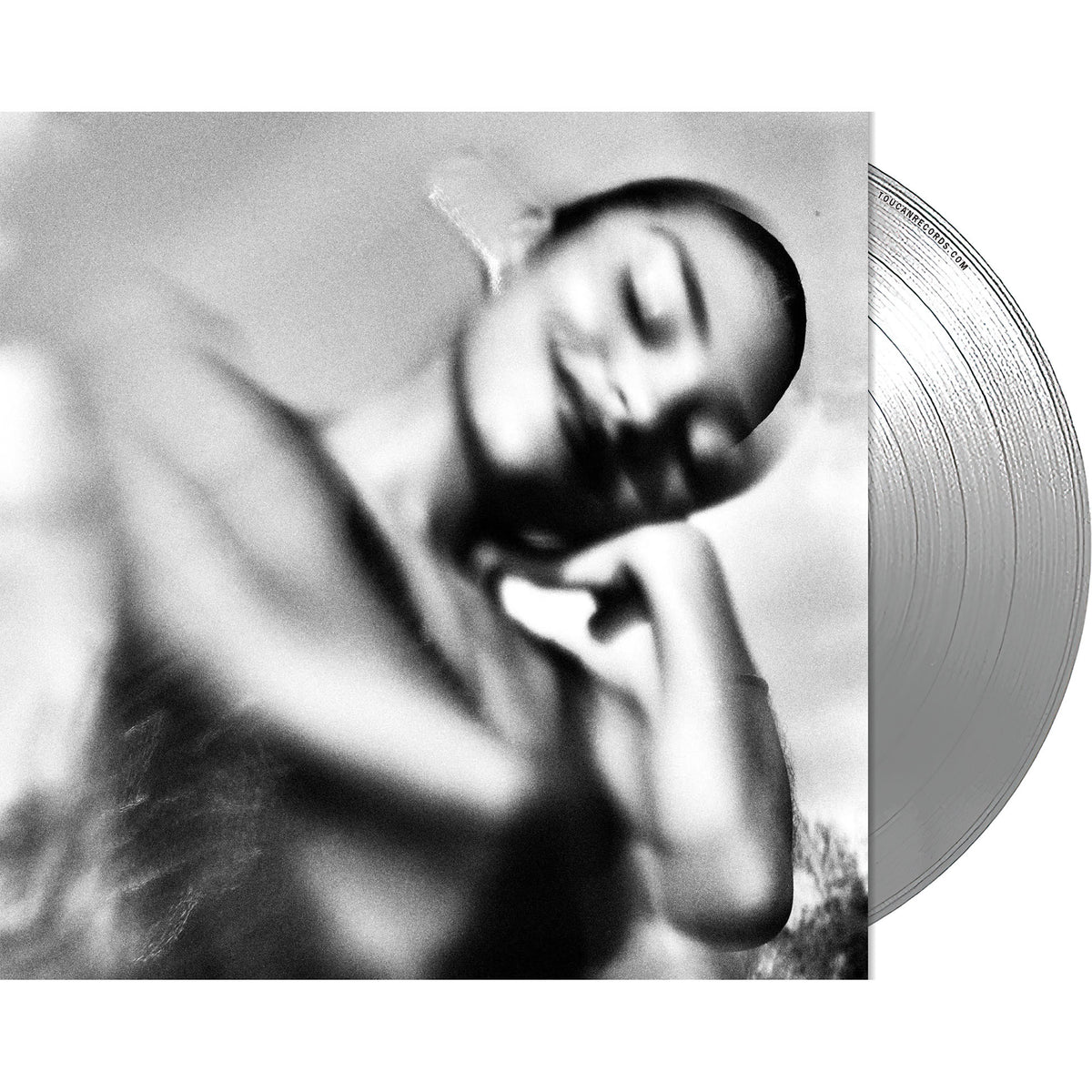 Olivia Dean The Art Of Loving packshot showing limited 180g silver vinyl LP and half-speed master at ToucanRecords.com. soul-pop and contemporary R&B album.