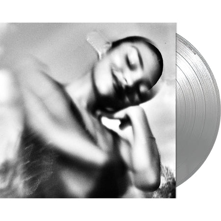 Olivia Dean The Art Of Loving packshot showing limited 180g silver vinyl LP and half-speed master at ToucanRecords.com. soul-pop and contemporary R&B album.