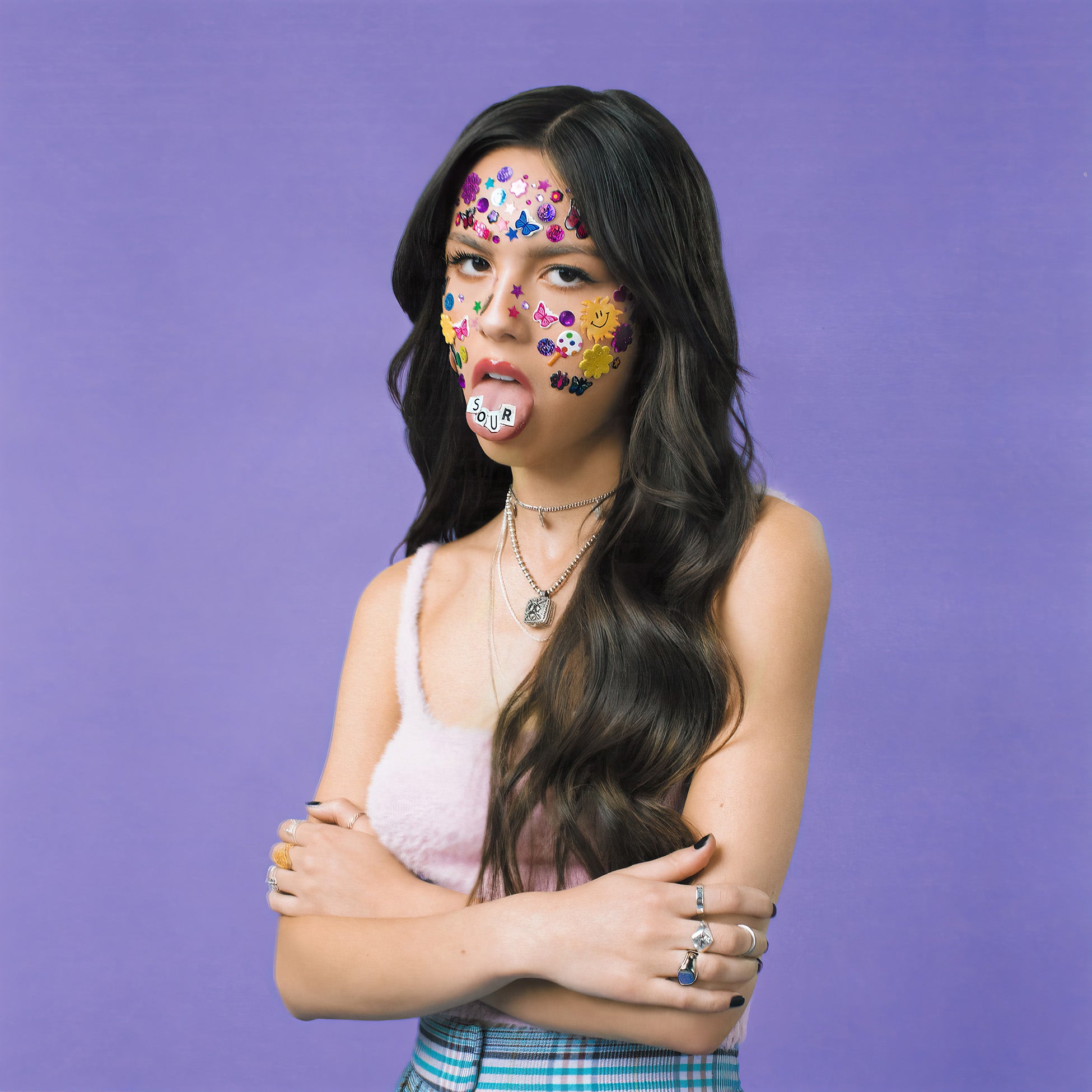 Olivia Rodrigo SOUR album cover art black vinyl LP featuring "deja vu," "traitor," and "favorite crime"