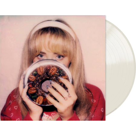 Sabrina Carpenter Fruitcake milky clear vinyl EP packshot with single-pocket jacket and a playful six-song holiday tracklist