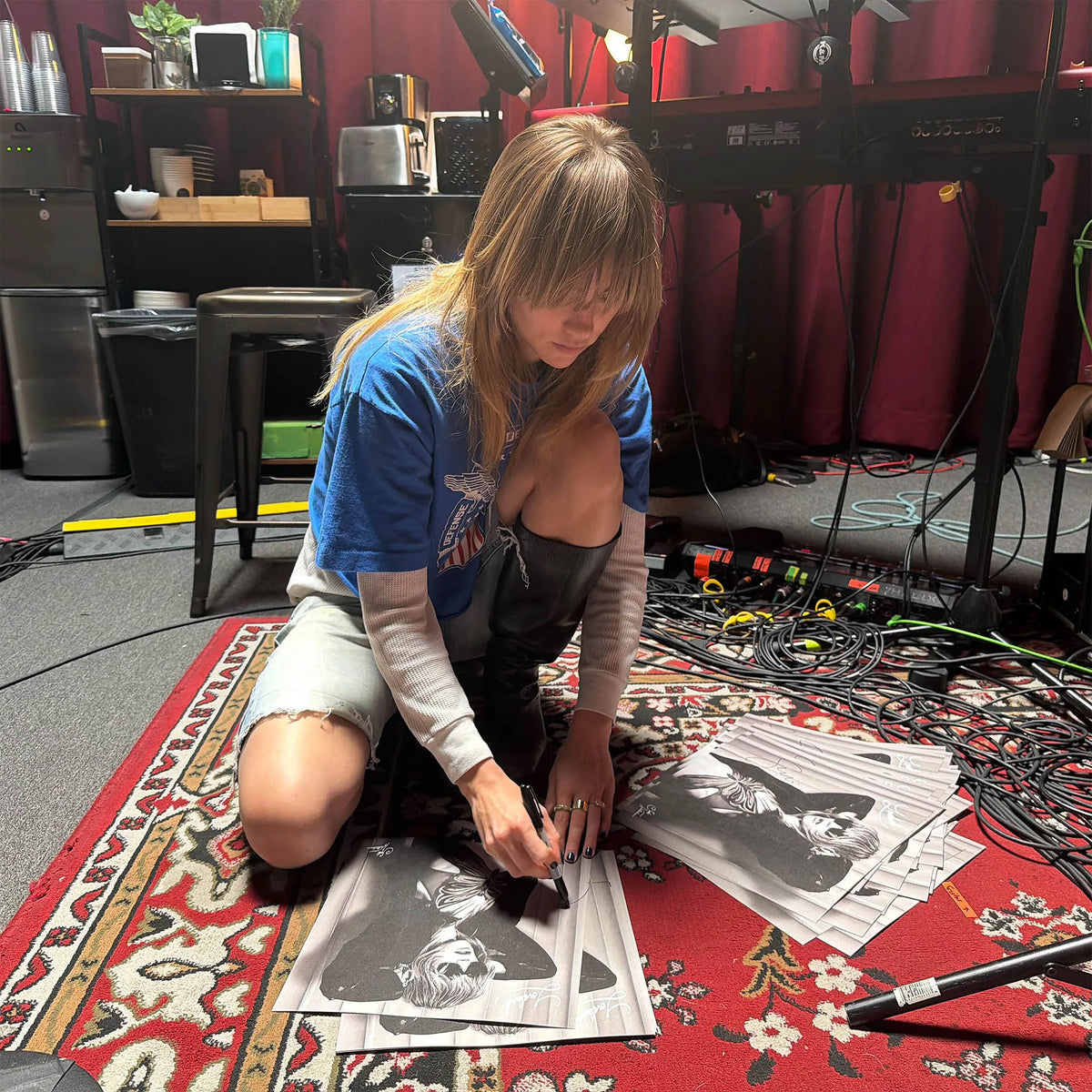 Suki Waterhouse - Loveland showing Suki Waterhouse signing album insert artwork. The record is pressed on pink indie exclusive vinyl and housed in a gatefold jacket.