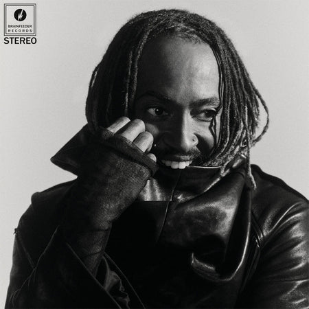 Thundercat Distracted album cover art vinyl LP on red colored vinyl with "No More Lies" and "She Knows Too Much" at ToucanRecords.com